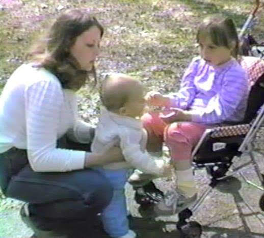 Baby Hez with mum and sister